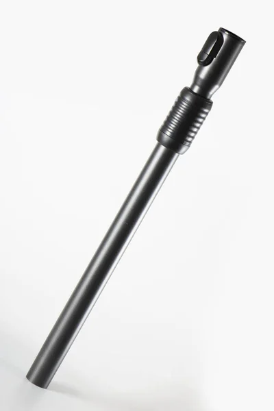 金属管条黑色为真空吸尘器 在白色背景上 选择性对焦关闭 — 图库照片