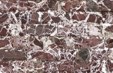 Sarı doku tuğla kahverengi ve beyaz arka plan ile vahşi mermer