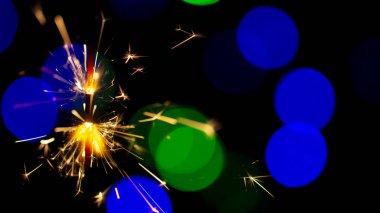 maytap ışıklar Garland bokeh arka plan üzerinde yanan yakın çekim