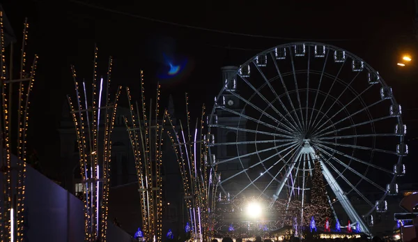 Wheel of View at Kontraktova Square, Kiev. Night city. Close up