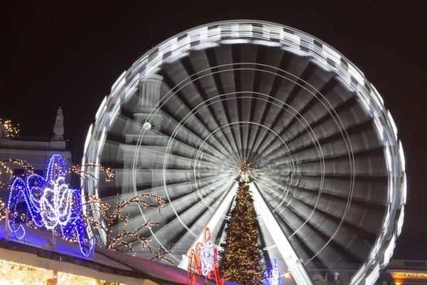 Wheel of View at Kontraktova Square, Kiev. Night city. Close up