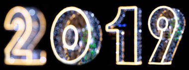 Bokeh ve bulanıklık numarası 2019. Bokeh çizgi, renkli bokeh perde, okyanus mavi ve altın rengi bokeh hattı. Mutlu yeni yıl 2019. Noel için aydınlatma.