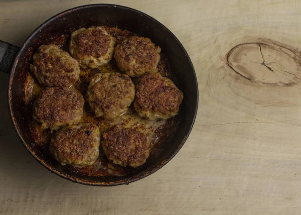 Stock image Fresh meat cutlets in a frying pan grill.