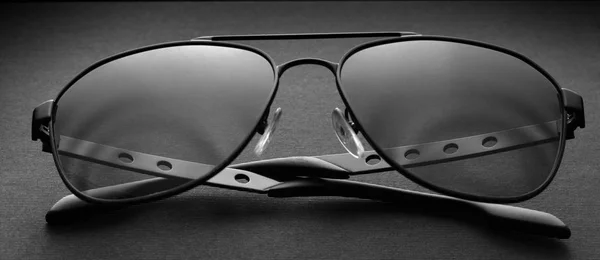 Black Polarizing Sunglasses Metal Frame Black Fabric Background Close — Stock Photo, Image