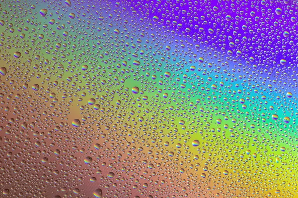 Gotas Agua Vaso Con Reflejo Del Arco Iris Contexto —  Fotos de Stock