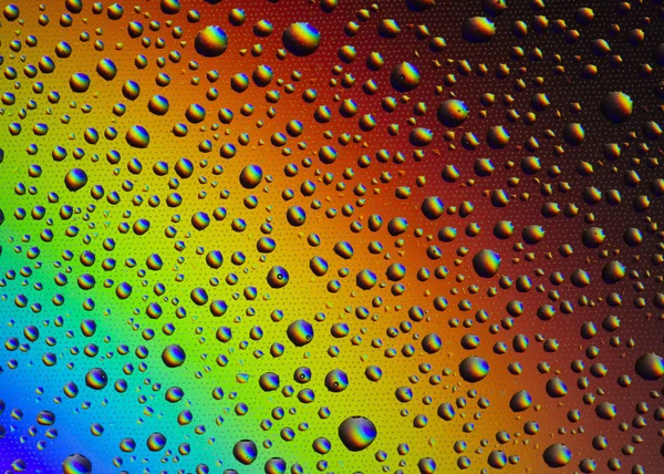 Gotas Agua Vaso Con Reflejo Del Arco Iris Contexto —  Fotos de Stock