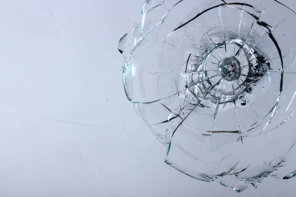 Cracked glass on a white background texture