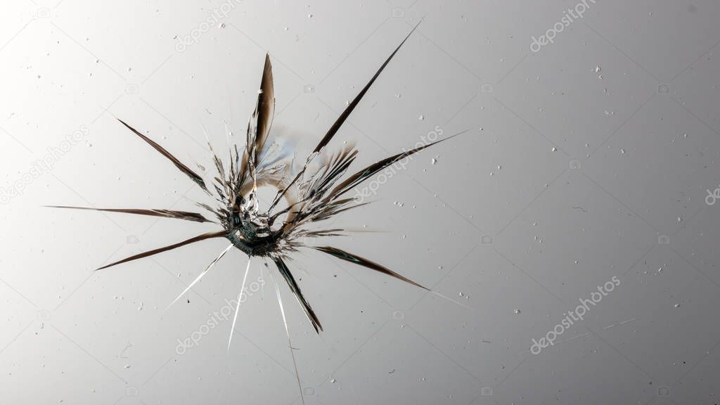 Cracked glass on a white background texture