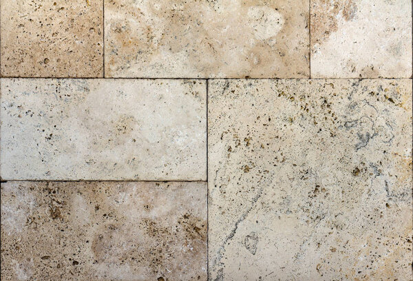 texture of the wall of natural stone, travertine, sandstone and marble