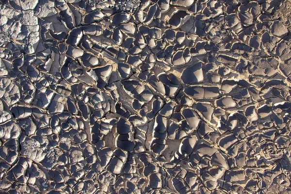 Detalhes da seca da terra rachada de perto — Fotografia de Stock