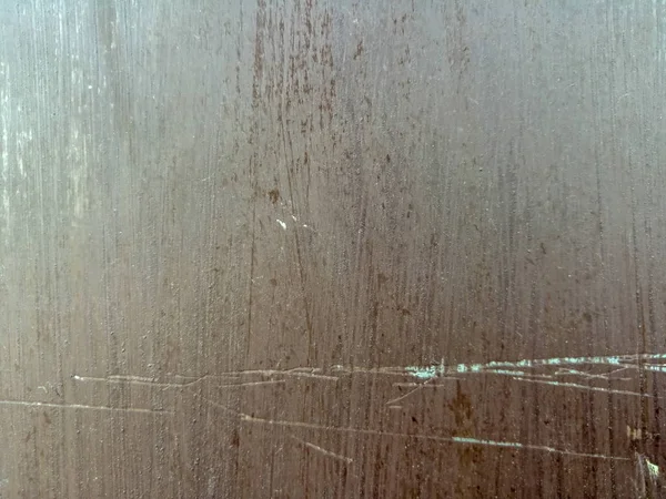 Eski metal mutfak yüzeyinin paslı dokusu.