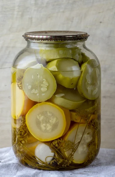 Canned courgettes in a glass jar in the cellar — Stock Photo, Image