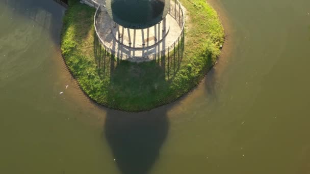 Theophania Park, a gazebo on a small island in the middle of the lake, top view, drone flight — Stock Video