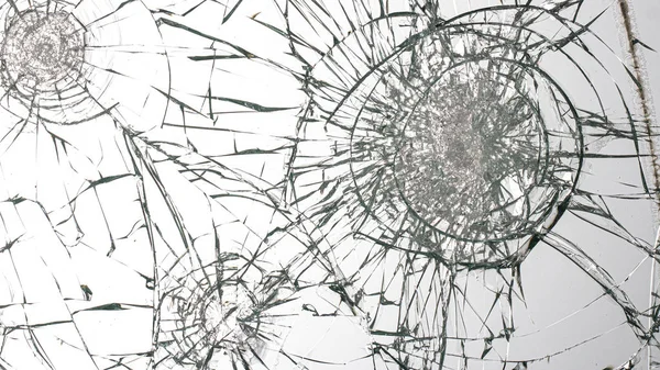 Cracked glass on a white background texture