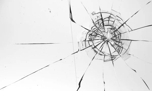 Cracked glass on a white background texture