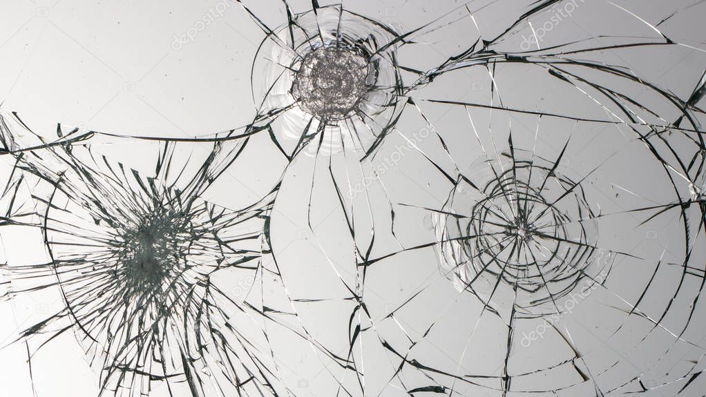 Cracked glass on a white background texture