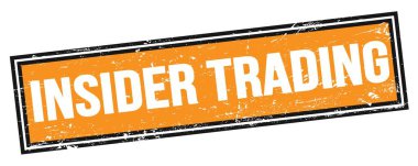 Turuncu, kirli, dikdörtgen damgalı bir yazı üzerinde geziniyor..