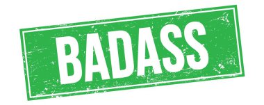 Yeşil grungy dikdörtgen mühür işareti üzerine BADASS metni.