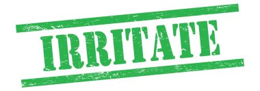 Yeşil grungy vintage kauçuk damga üzerinde IRRITATE metin.
