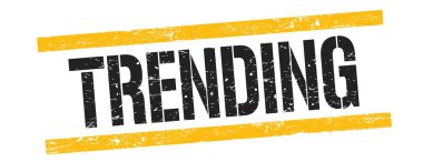 Siyah sarı grungy satır işareti üzerinde TRENDING metin.