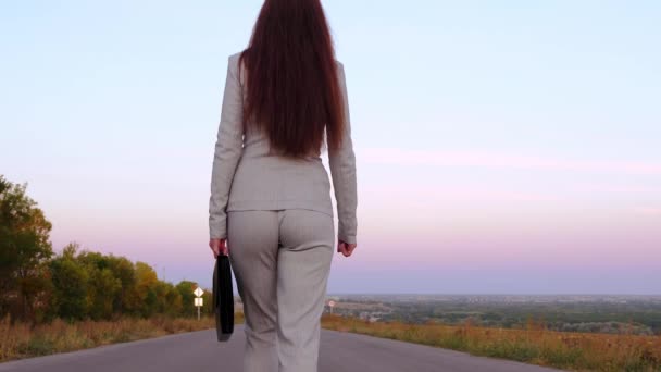 Business Woman Carries Black Briefcase Documents Her Left Hand View — Stock Video