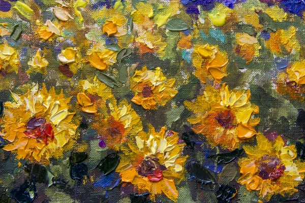 Yellow orange sunflowers - a textured fragment of a close-up oil painting. Impressionism flowers of a sunflower on a canvas