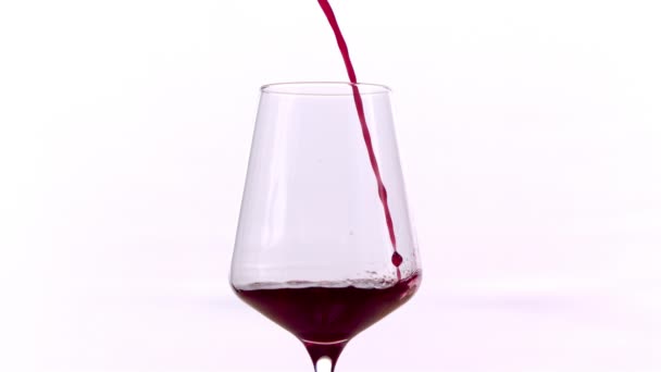 Red Wine Pouring Glass White Background Slow Motion — Stock Video