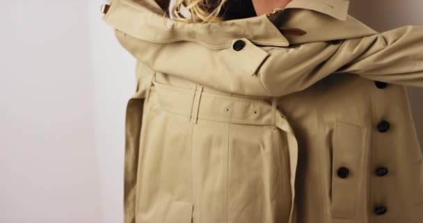 Footage Beautiful Blonde Woman Trench Coat Lingerie Front White Wall — Stockvideo