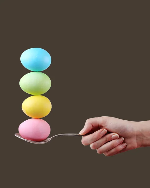Female Hand Holds Spoon Which Multi Colored Eggs Balanced Brown — Stock Photo, Image