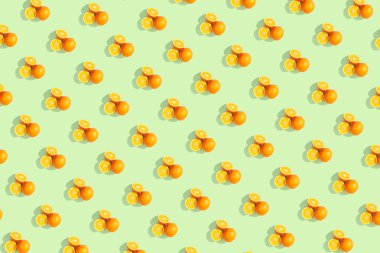 Portakal parlak renkli arka plan üzerinde. Yinelenen desen, duvar kağıdı narenciye ruh hali için hazırlık.