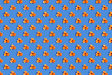 Portakal parlak renkli arka plan üzerinde. Yinelenen desen, duvar kağıdı narenciye ruh hali için hazırlık.