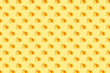 Parlak renkli sarı zemin üzerine portakal. Yinelenen desen, 