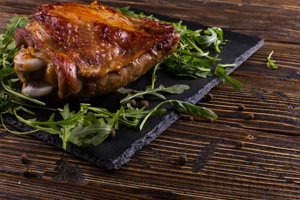 Thigh turkey baked in the oven with spices on black stone board. Healthy food. Thanksgiving dinner. — Stock Photo, Image