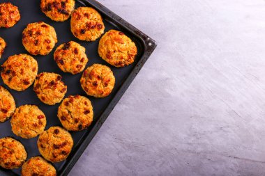 Baked cottage cheese and oatmeal cookies with raisins. Healthy nutrition, diet food.