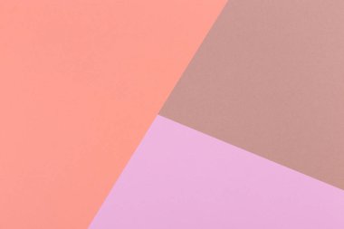 Kağıt turuncu, pembe, kahverengi boş arka plan, geometrik olarak yer. Sunular için renk boş, kopyalama alanı.