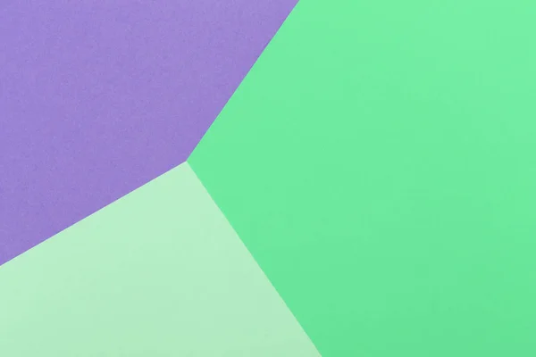 纸紫色，绿色，薄荷，柔和，糖果背景，几何位置。演示文稿的颜色空白，复制空间. — 图库照片