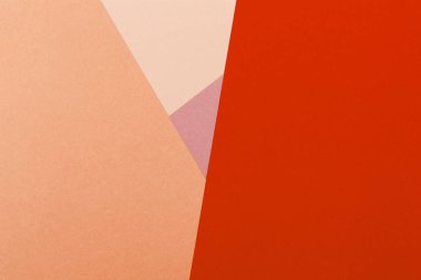Kağıt kırmızı, turuncu, pastel boş arka plan, geometrik olarak yer. Sunular için renk boş, kopyalama alanı.