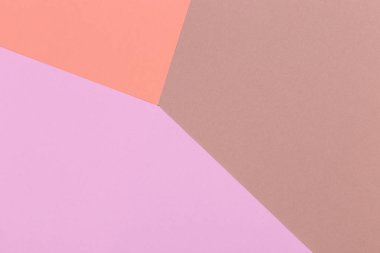 Kağıt turuncu, pembe, kahverengi boş arka plan, geometrik olarak yer. Sunular için renk boş, kopyalama alanı.