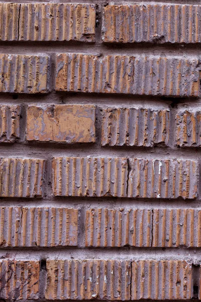 Oude rode bakstenen muur, rustieke textuur, ontwerp verticale achtergrond. — Stockfoto