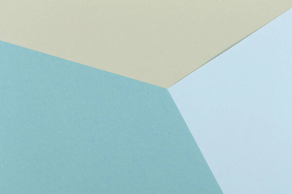 Paper yellow, blue empty background, geometrically located. Color blank for presentations, copy space.