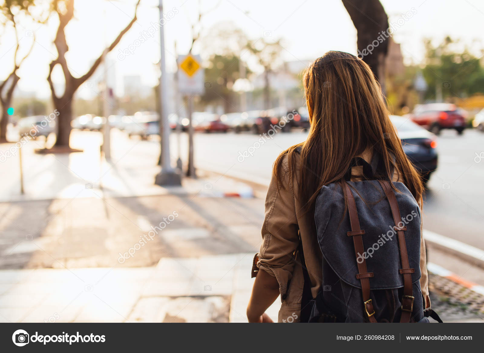 Young female tourist backpacker on Khao San road in Bangkok