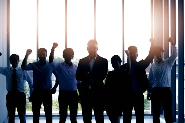 Silhouetten van succesvol business team — Stockfoto