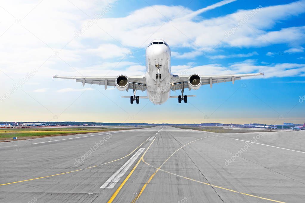 Passenger airplane the asphalt landing on a runway airport