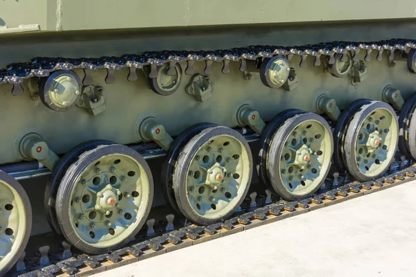stock image Caterpillar wheels of a tank of green color close-up