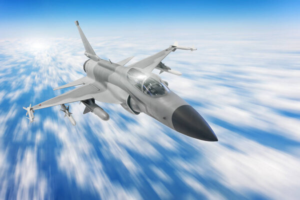 Military fighter aircraft at high speed, flying high in blue sky