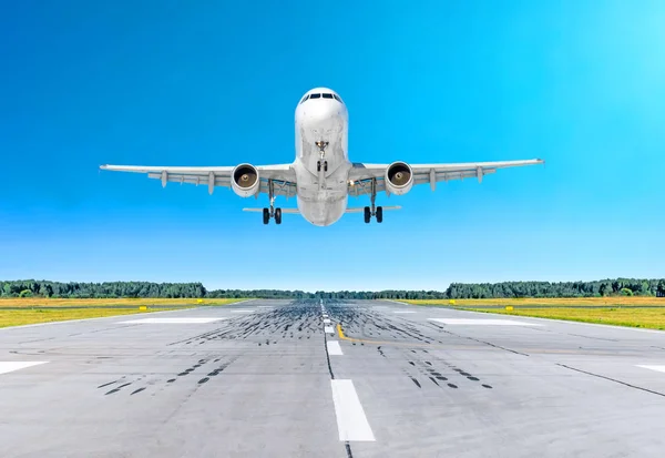 Airplane aircraft flying departure after flight, landing on a runway in the good weather clear sky day