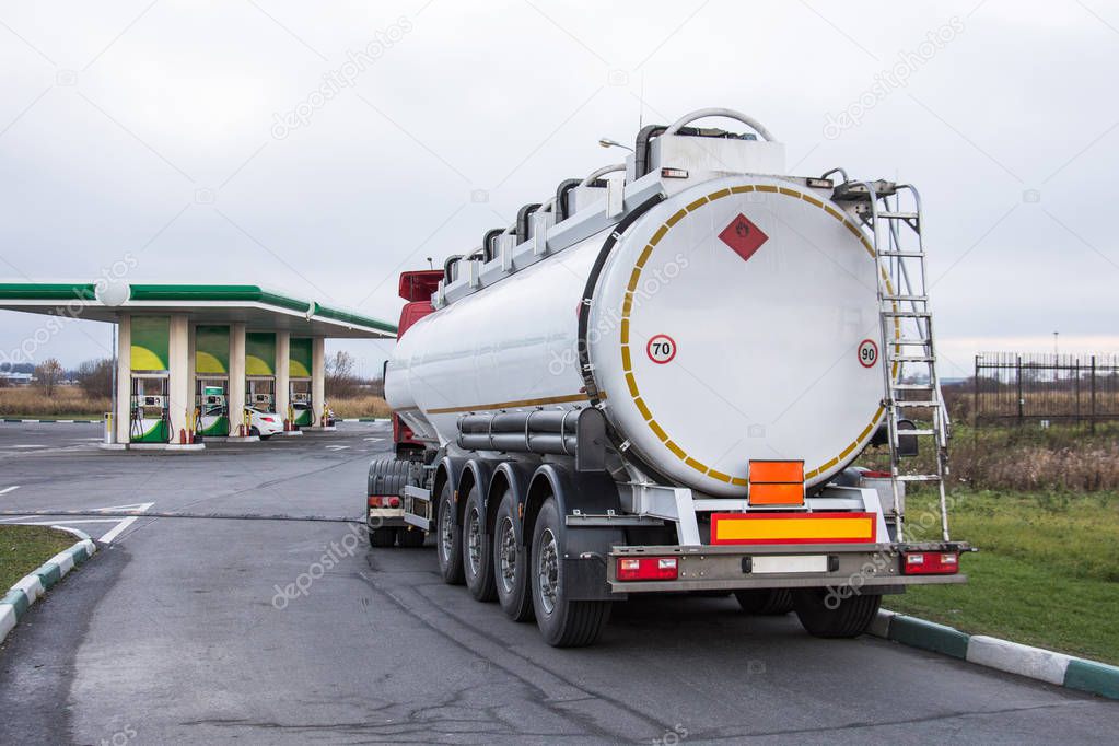 Truck with gasoline tank fuel before unloading at a gas station