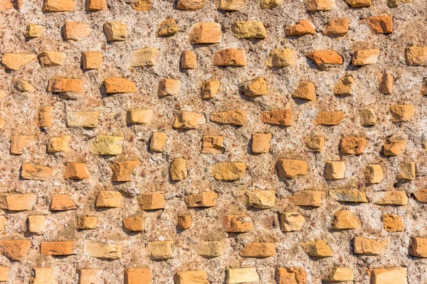 Piedras seleccionadas en la pared, la textura del patrón antiguo . — Foto de Stock