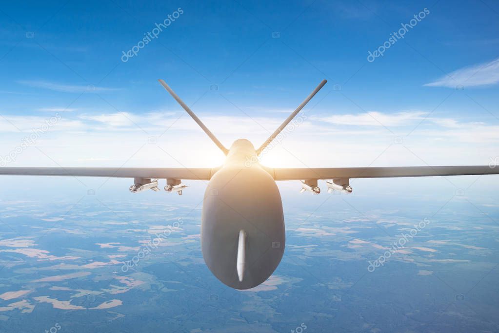Military drone close up view, flying high in the sky