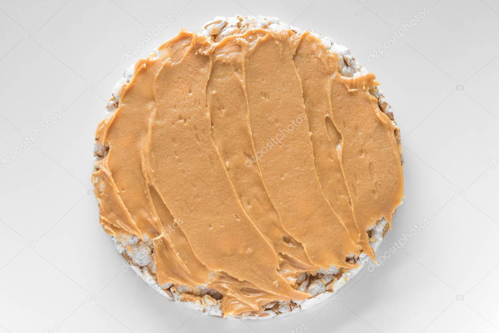 Rice cereal cracker with peanut paste butter